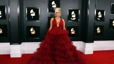 Bebe Rexha in a big, bold red gown by Bahraini designer Monsoori. Photo: AP