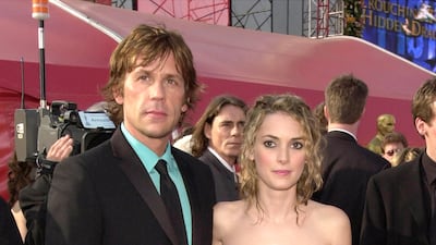 Winona Ryder wears a golden gown for the 73rd Annual Academy Awards March 25, 2001, at the Shrine Auditorium in Los Angeles. Getty