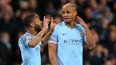 Raheem Sterling, left, scored all three of Manchester City's goals against Watford, leading to huge praise from captain Vincent Kompnay, right. Getty