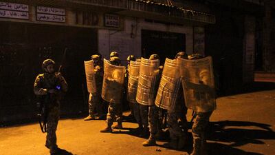 Army soldiers are deployed during clashes with demonstrators at a protest against the lockdown and worsening economic conditions, amid the spread of the coronavirus disease (COVID-19), in Tripoli, Lebanon. Reuters