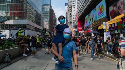 Demonstrators march on a street as they take part in a rally at Tsim Sha Tsui district in Hong Kong, China. Getty Images