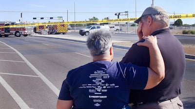 Pilot Ursula Richards, left, comforts fellow pilot Buzz Biernacki at the scene of the fatal hot-air balloon crash at Unser and Central SW in Albuquerque, New Mexico. AP Photo