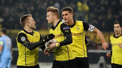 Borussia Dortmund now have nine points from five matches in Group F play, and with a plus-4 goal difference they currently edge Napoli, who also have nine points, for second place. Dennis Grombkowski / Getty Images / Bongarts