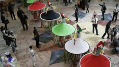 The Dubai Shopping Festival begins with a parade yesterday at the Mall of the Emirates.