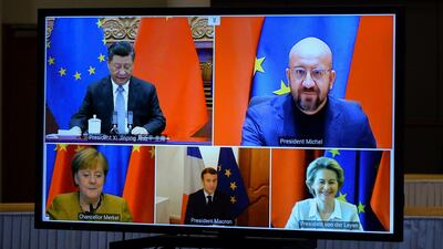 Ursula von der Leyen, Charles Michel, Angela Merkel, Emmanuel Macron and Xi Jinping are seen on screen during the video conference. Reuters