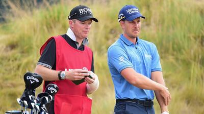 Henrik Stenson waits with his caddie Gareth Lord on the sixth tee. Harry How / Getty Images / June 18, 2015