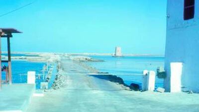 An archival photograph of the Maqta causeway in Abu Dhabi taken during Sheikh Zayed's reign in the 1960s.