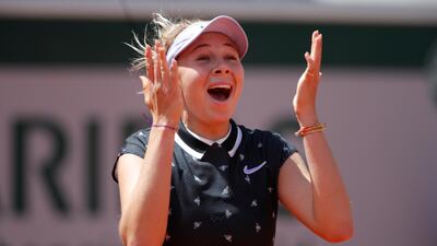 Amanda Anisimova reacts after beating Simona Halep in the French Open quarter-finals. Reuters