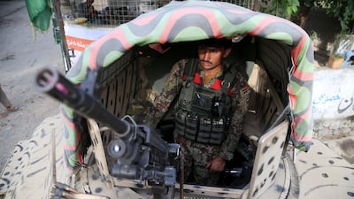 Afghan security officials secure a checkpoint in Bahsood district of Nangarhar province, Afghanistan, on August 6, 2018. EPA