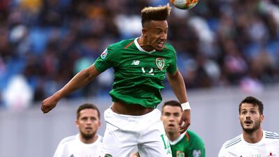 Republic of Ireland's Callum Robinson heads the ball. PA