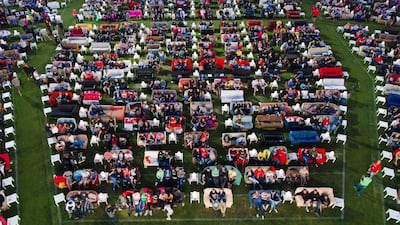 People sit on sofas as they watch the opening game of the 2014 World Cup between Brazil and Croatia at the Alte Forsterei stadium in Berlin, Germany. Thomas Peter / Reuters