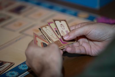The game's cards, layouts and general design were inspired by the architectural elements of the Sharjah Central Souk. Leslie Pableo for The National