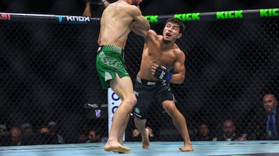Ramazan Temirov goes after Steve Erceg.