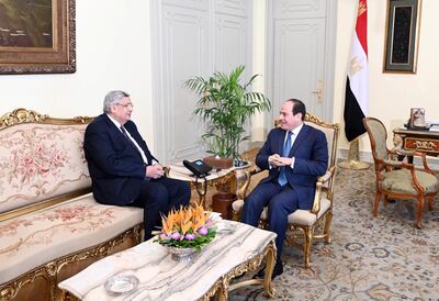 Egyptian President Abdel Fattah El Sisi meets Dr Mohamed Awad Tag Eldin following his appointment as an adviser to the president on health and prevention on March 21, 2020. Egyptian Presidency via Reuters