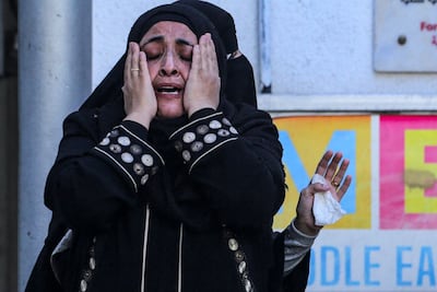 A Palestinian woman after an Israeli strike on a building in Nuseirat in Gaza. AFP