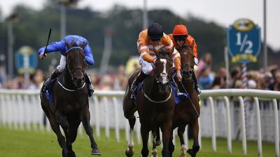 Kevin Manning rides Pleascach, left, to the win at the Darley Yorkshire Oaks at York racecourse on August 20, 2015 in York, England. Alan Crowhurst / Getty Images
