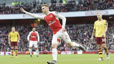 Arsenal's Calum Chambers celebrates scoring on Saturday in his team's FA Cup over Burnley at the Emirates Stadium. Facundo Arrizabalaga / EPA