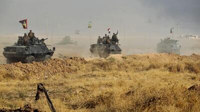 Up to 1.5 million civilians remain in the city, the United Nations said, voicing fears the vastly outnumbered Islamists could use them as human shields as they seek to repel the assault on its last major stronghold in the country. Ahmad Al-Rubaye / AFP