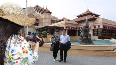 Chinese outbound tourism growth rate is forecast at 10.4 per cent annually from 2013 to 2020. Above, Chinese tourists visit Anantara Hotel at The Palm in Dubai. Jeffrey E Biteng / The National