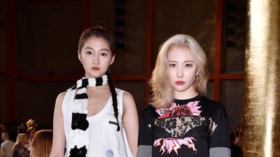 Chinese actress Guan Xiaotong and South Korean singer Sunmi at Milan Fashion Week. Photo: Pietro D'Aprano / Getty Images for Prada