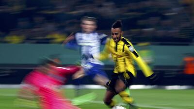 Borussia Dortmund’s Pierre-Emerick Aubameyang tries to dribble around Hertha Berlin goalkeeper Rune Jarstein. Wolfgang Rattay / Reuters