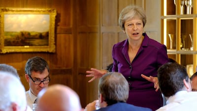 Britain's Prime Minister Theresa May commences a meeting with her cabinet to discuss the government's Brexit plans at Chequers, the Prime Minister's official country residence. MOD / Handout via Reuters