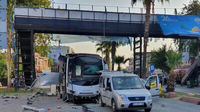 The bus after it was hit by a bomb attack in Adana, Turkey, September 25, 2019. Demiroren News Agency (DHA) via Reuters