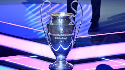 Thirty-six teams will be aiming to lift the Uefa Champions League trophy. AFP