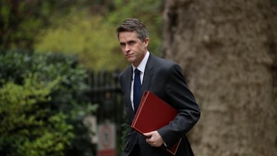 FILE - In this Tuesday, April 2, 2019 file photo, Britain's Defence Secretary Gavin Williamson arrives for a cabinet meeting in 10 Downing Street, London. British Defense Secretary Gavin Williamson has been fired Wednesday, May 1 after an investigation into leaks from a secret government meeting about Chinese telecoms firm Huawei. Prime Minister Theresa May's office says May has "lost confidence" in Williamson. (AP Photo/Matt Dunham)