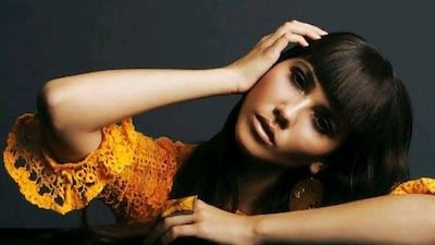 Dress, Dh570, Topshop. Earrings, Dh20, Splash. Ring, Dh39, H&M.