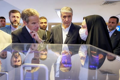 Rafael Grossi tours the Atomic Energy Organisation of Iran with its leader, Mohammad Eslami. AFP