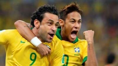 Brazil’s Fred, left, and Neymar celebrate a goal in the Confederations Cup final against Spain. Neymar scored four goals in the tournament. Vanderlei Almeida / AFP