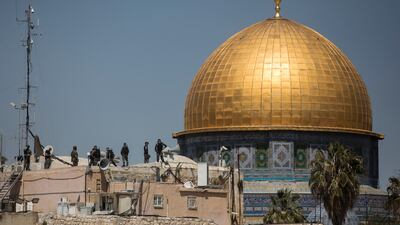 Israeli police officers keep watch after clashes with Muslim worshippers in Jerusalem. The overlapping religious occasions – Ramadan for Muslims, Passover for Jews and Easter for Christians – have increased tensions near contested sacred sites in Jerusalem. Getty Images