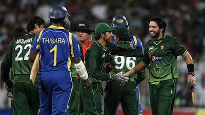Shahid Afridi, right, made an impressive return to international cricket, which culminated in an all-round performance against Sri Lanka in Sharjah on Sunday. Afridi had retired following a spat with Ijaz Butt that resulted in his dismissal as captain of the limited-overs team.