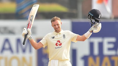 Joe Roots celebrates after reaching 150.