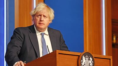 Prime Minister Boris Johnson at a press conference in Downing Street after ministers met to consider imposing new restrictions in response to rising cases and the spread of the Omicron variant. PA