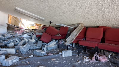 The altar inside La Vid Verdaderas Church stands damaged in Arabi, Louisiana. The Times-Picayune / The New Orleans Advocate / AP