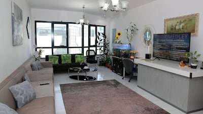 The living room has plenty of natural light