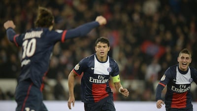 Zlatan Ibrahimovic, left, Thiago Silva, center and Marco Verratti, right, celebrated on Sunday as both Ibrahimovic and Silva scored in a 4-0 victory. Martin Bureau / AFP