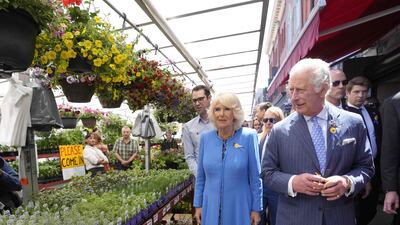 Britain's Prince Charles and Camilla, Duchess of Cornwall, tour the Byward Market in Ottawa on May 18, 2022. AFP