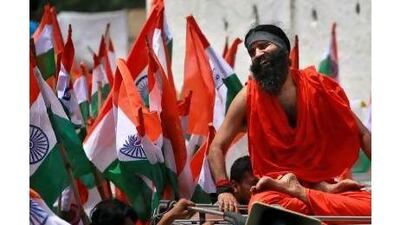 A reader praises the anti-corruption activities of Indian television yoga guru Baba Ramdev. Kevin Frayer / AP