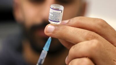 Pfizer developed a Covid-19 vaccine with BioNtech. Now Abu Dhabi and Pfizer are working together to boost expertise in clinical trials. AFP