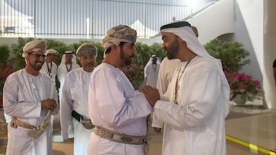 Sheikh Mohamed bin Zayed, Crown Prince of Abu Dhabi and Deputy Supreme Commander of the UAE Armed Forces (L) greets Sayyid Khalid Bin Hilal Al Busaidi, Minister of Diwan of Royal Court of Oman (2nd L), on the final day of the 2018 Formula 1 Etihad Airways Abu Dhabi Grand Prix, in Shams Tower. Mohamed Al Hammadi / Ministry of Presidential Affairs