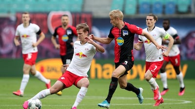 Leipzig's Daniel Carvajal under pressure from Per Skjelbred of Hertha Berlin. Getty