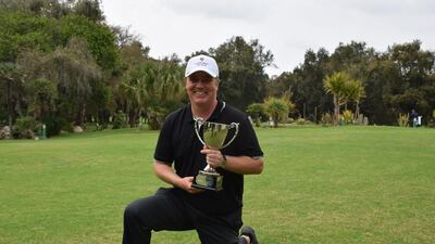 Englishman Ross McGowan with the Royal Golf Dar Es Salam Open trophy. Courtesy Mena