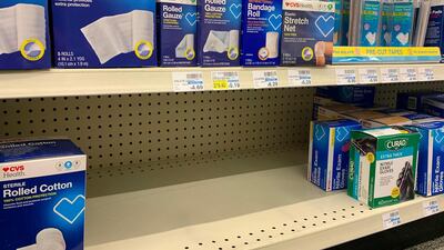 An empty shelf in a local pharmacy that used to contain protective masks which are now sold out, as people scramble to protect against the spread of the Coronavirus, in Los Angeles, California. AFP