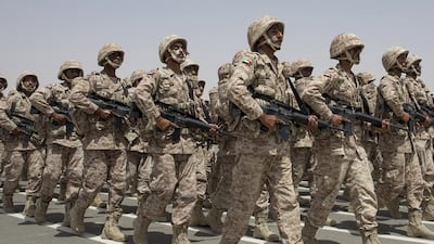 Armed Forces members march in a ceremony marking the 40th anniversary of the military unification. Ryan Carter / Crown Prince Court
