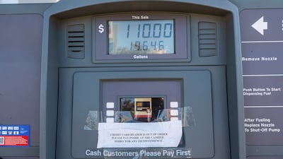 A petrol pump displays the price paid for 19. 646 gallons of gasoline at a Chevron gas station in California. Chevron's net income soared 385% in Q2, helped by higher oil prices. Bloomberg