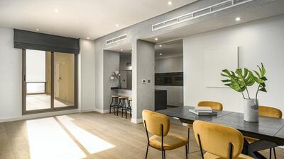 Natural light fills the dining area. Courtesy LuxuryProperty.com