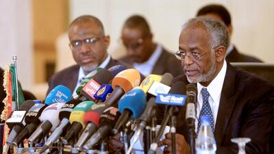 Sudanese Foreign Minister Ali Karti, right. Nile dam talks between the foreign and water ministers of Egypt, Sudan and Ethiopia have reached a preliminary agreement. Ashraf Shazly / AFP Photo